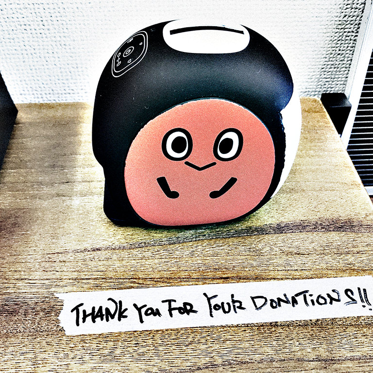 貯金箱に10円を